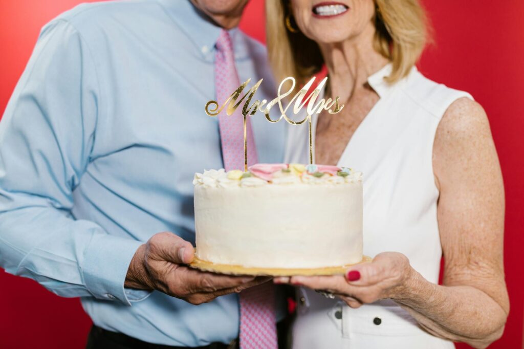 A happy couple celebrating with a small cake after their quick wedding in Las Vegas. — Las Vegas elopement