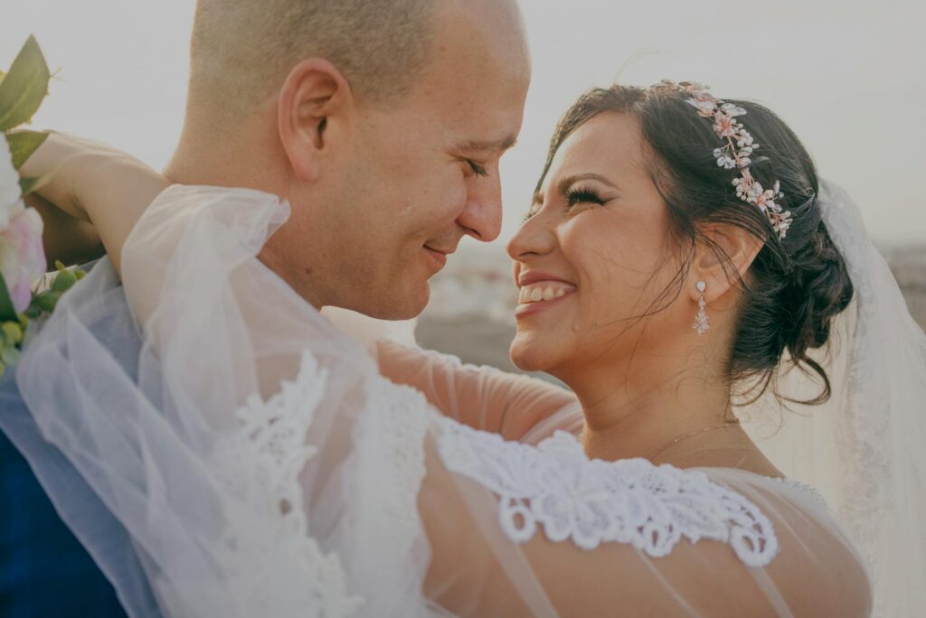 A happy couple posing for a wedding photo against the Las Vegas skyline. — affordable wedding photography Las Vegas