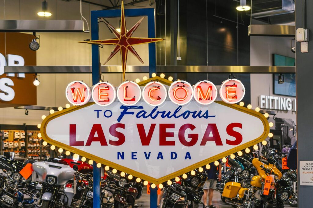 A joyful couple celebrating their elopement with a fun Las Vegas backdrop. — last-minute wedding Las Vegas