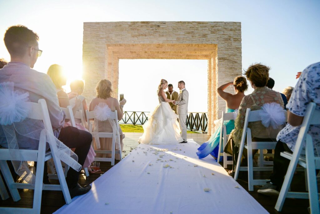 A vibrant summer wedding with guests enjoying the warm weather. — best time to marry Las Vegas