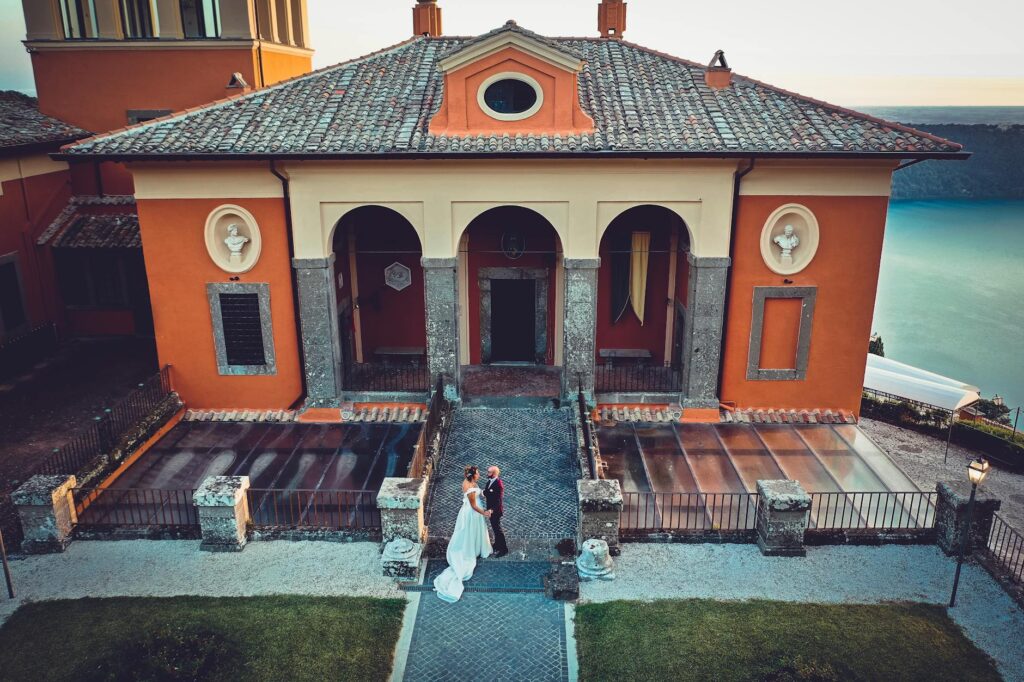 A wedding concierge discussing plans with a couple at a picturesque location. — Las Vegas wedding concierge services