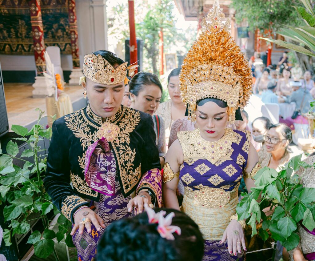 A wedding planner discussing local cultural elements with a couple. — Las Vegas wedding local culture