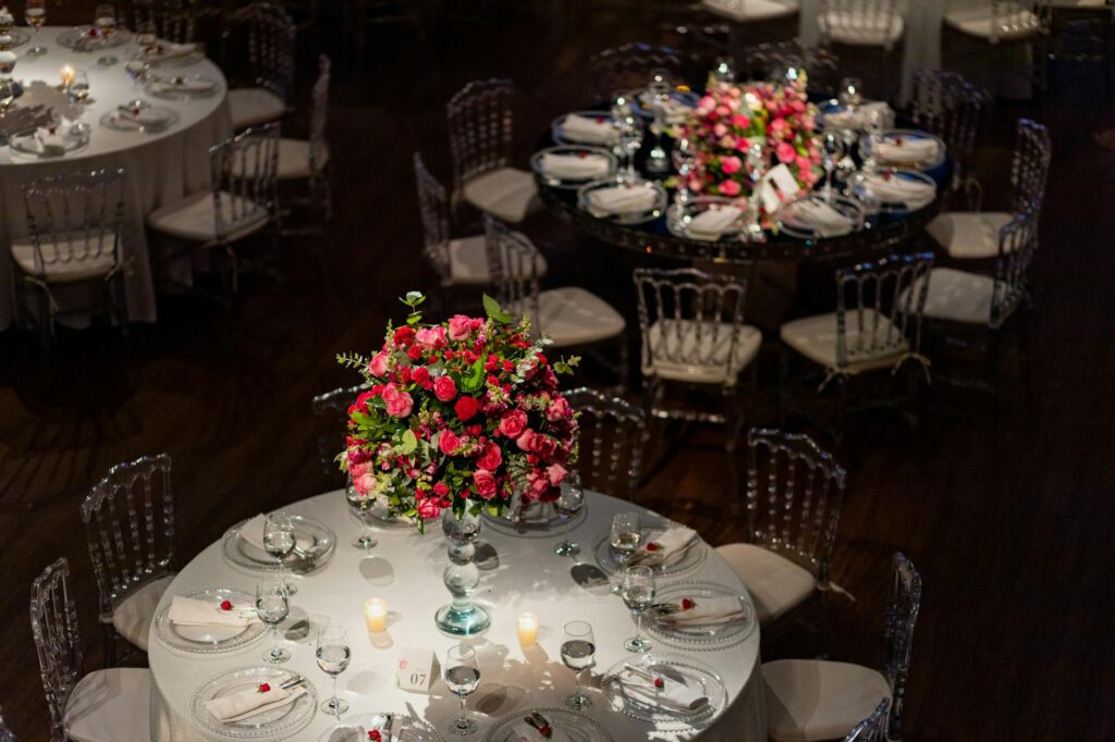 An aerial view of a themed wedding reception with vibrant centerpieces. — themed weddings Las Vegas