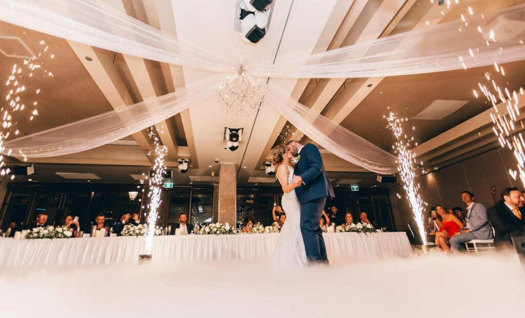 An artistic photo showcasing a couple's first dance in a luxurious Las Vegas venue. — wedding photographers Las Vegas
