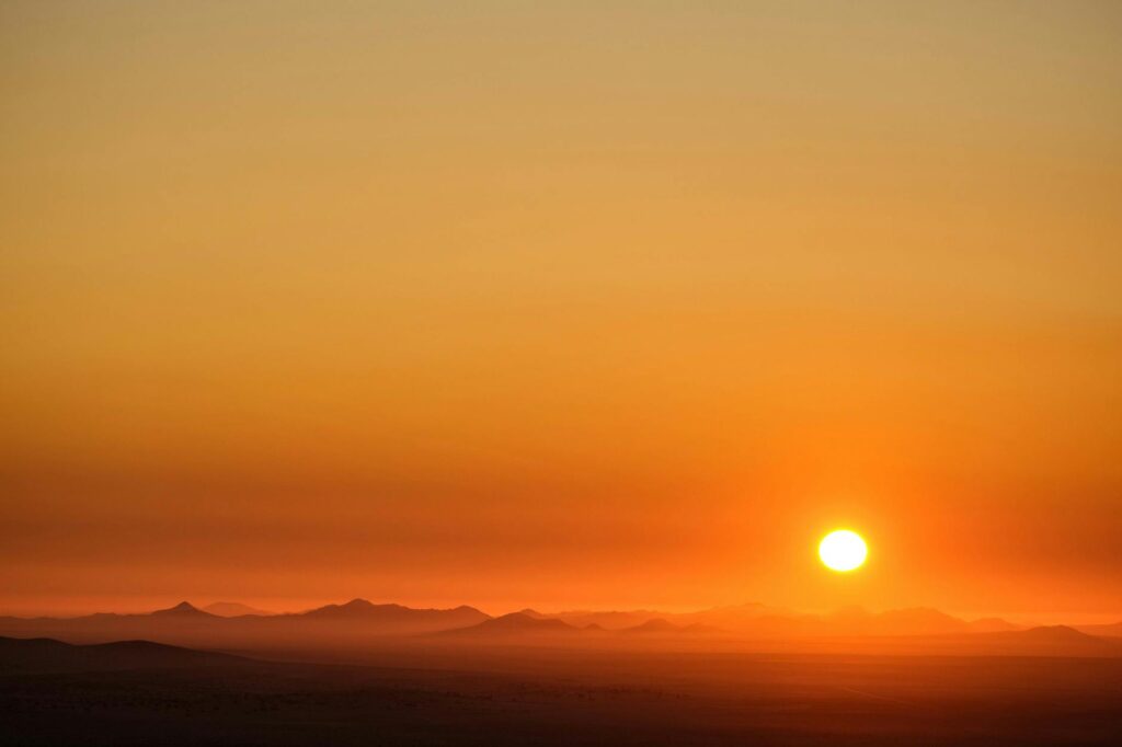 An intimate desert elopement setting with a stunning sunset backdrop. — Las Vegas wedding themes