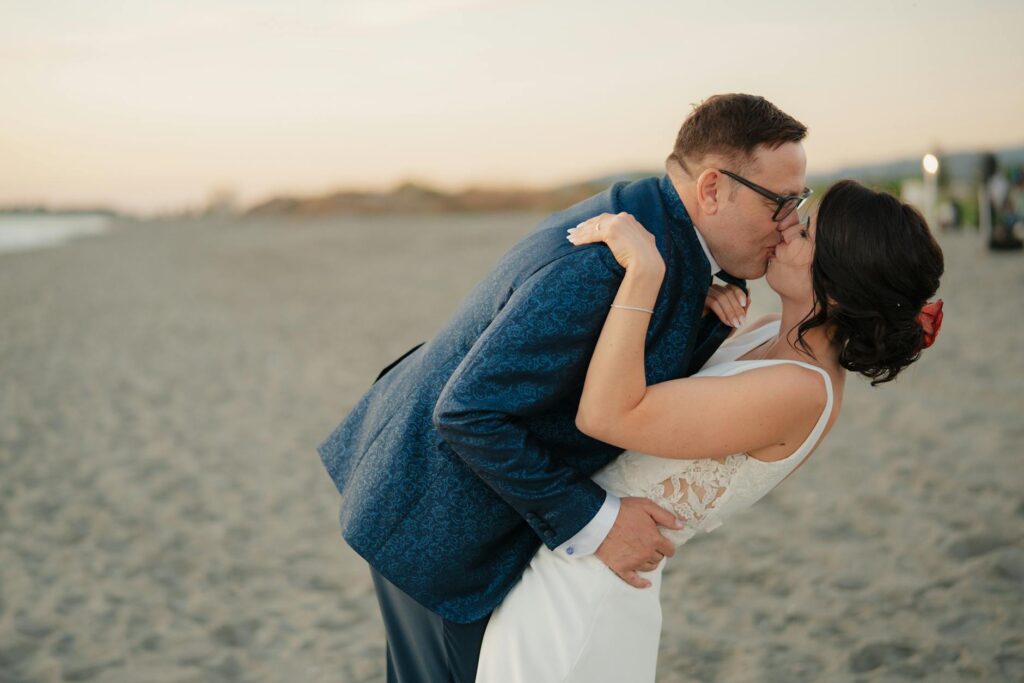 An intimate moment between newlyweds during a sunset photo session. — Las Vegas wedding photographers