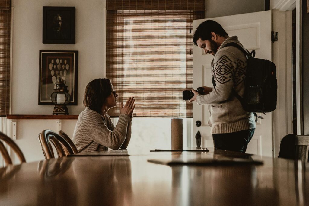 Couple discussing wedding photography styles with a photographer. — Las Vegas wedding photographer