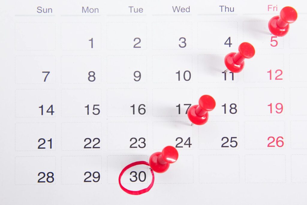 A calendar marked with important wedding planning dates. — Las Vegas wedding planning checklist