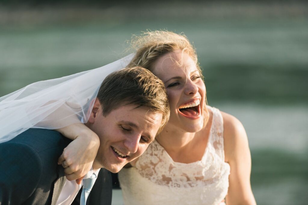 A candid moment of laughter and joy between a couple during their wedding photoshoot. — wedding photographers Las Vegas