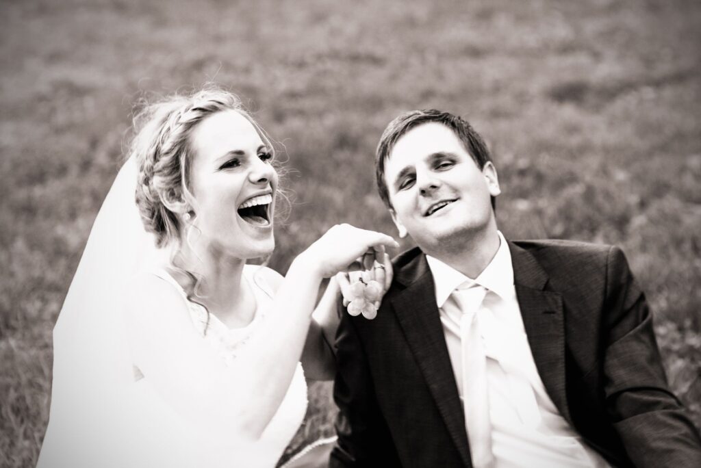 A candid shot of a couple laughing during a wedding ceremony in Las Vegas, showcasing documentary-style photography. — w…