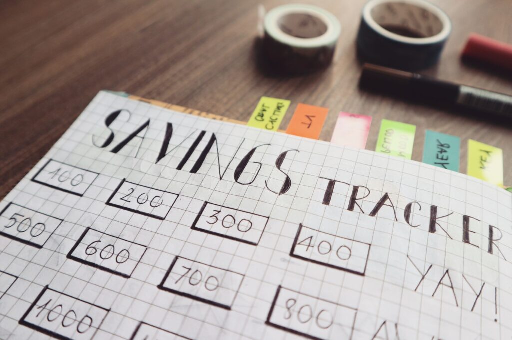 A close-up of a wedding budget planner with colorful charts and notes. — Las Vegas wedding budgeting
