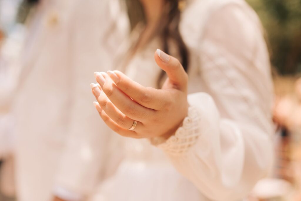 A close-up of wedding rings on a decorated table at an elopement. — Las Vegas elopement guide