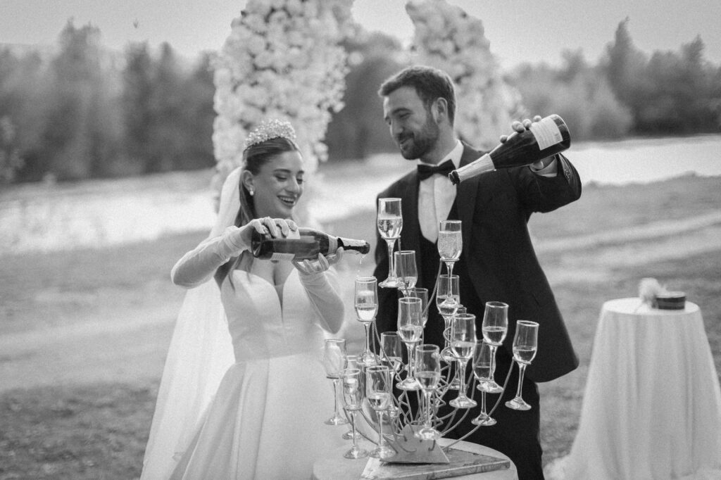 A couple celebrating with champagne after their elopement in Las Vegas — Las Vegas elopement planning