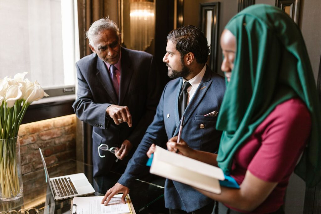 A couple discussing their wedding plans with a venue manager, highlighting negotiation. — affordable wedding venues Las …