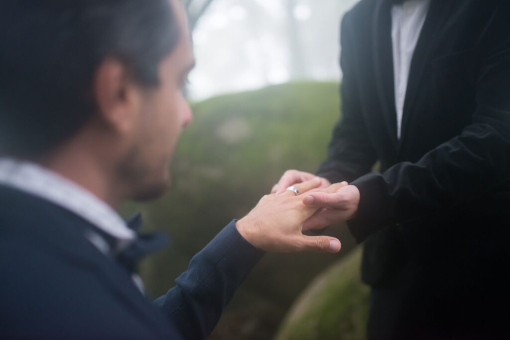 A couple exchanging vows in a scenic outdoor location, showcasing the beauty of intimate weddings Las Vegas. — Las Vegas…