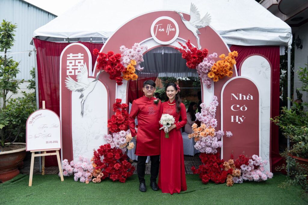 A couple happily viewing their wedding setup, representing successful collaboration with their planner. — questions for …
