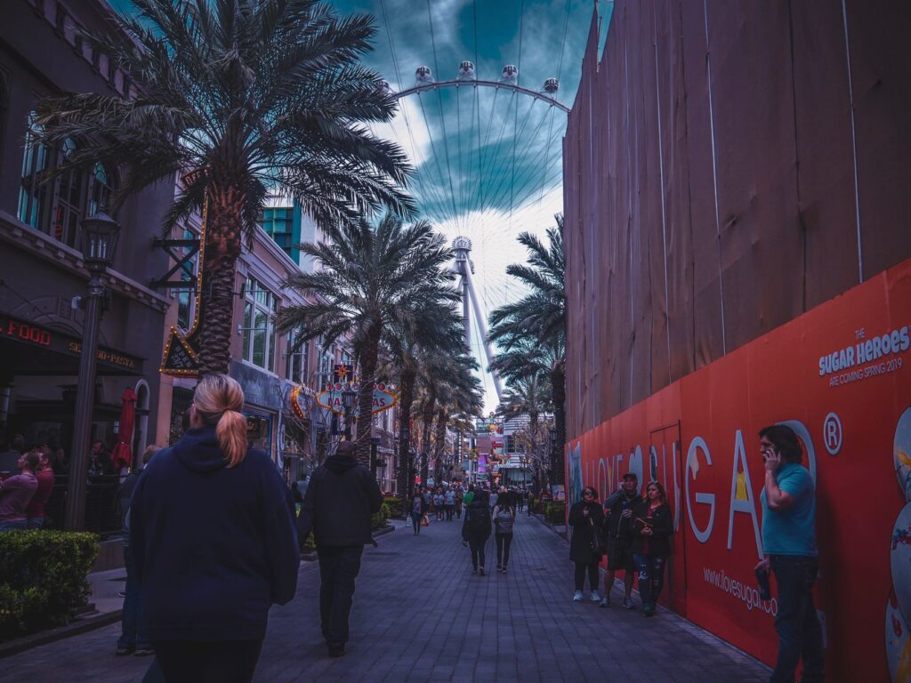 A group of wedding guests exploring local attractions in Las Vegas before the wedding, showcasing the city's vibrant atmos…