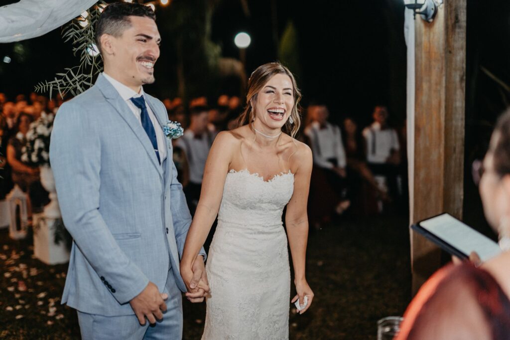 A joyful couple celebrating with friends at a budget wedding venue in Las Vegas. — affordable wedding packages Las Vegas