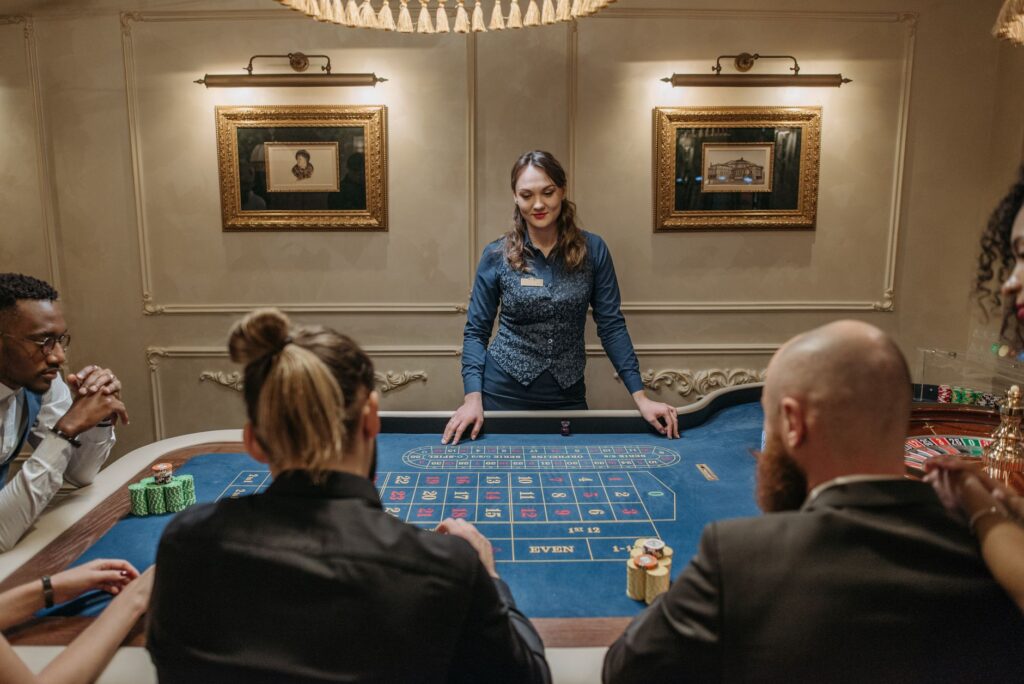 A luxurious casino-themed wedding with poker tables, high-end decor, and guests in formal attire. — unique wedding theme…