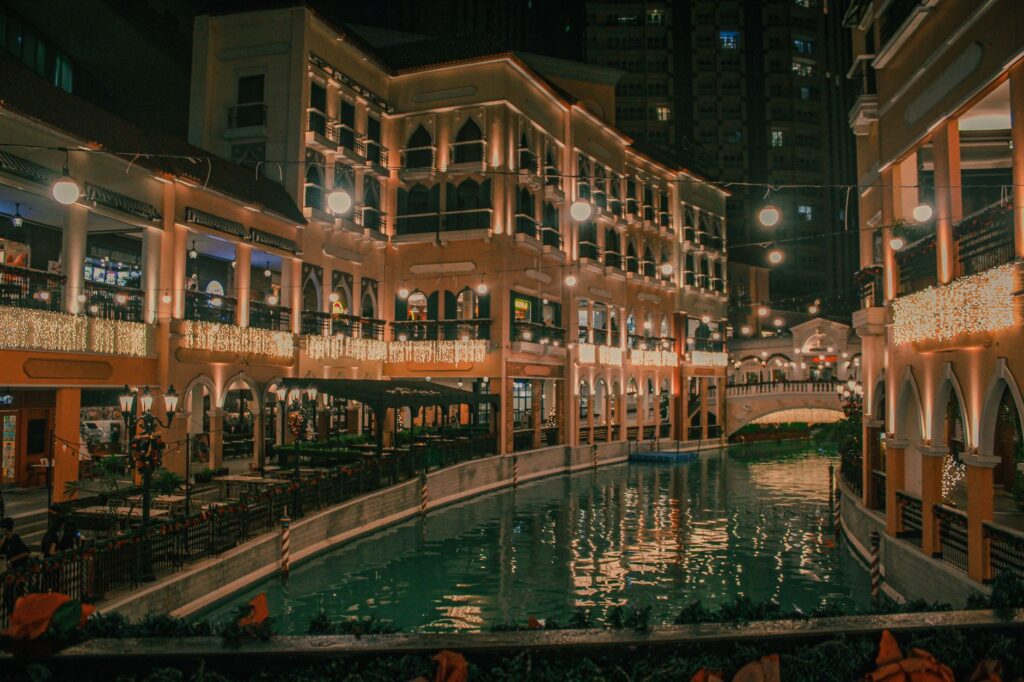 A stunning aerial view of The Venetian lit up at night, showcasing its romantic ambiance. — Las Vegas wedding venues