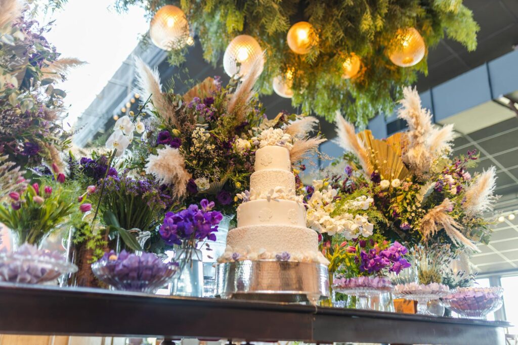 A wedding cake adorned with Las Vegas-themed decorations, capturing the spirit of the city. — Las Vegas elopement