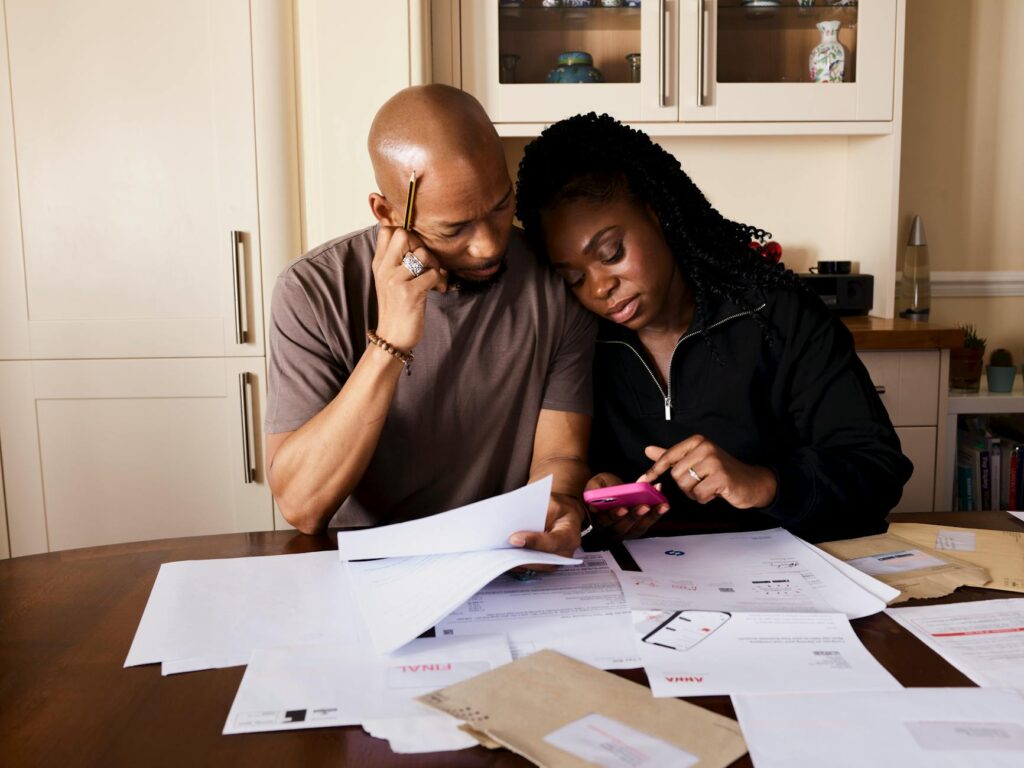 A wedding planner discussing budget options with a couple. — Las Vegas wedding budgeting