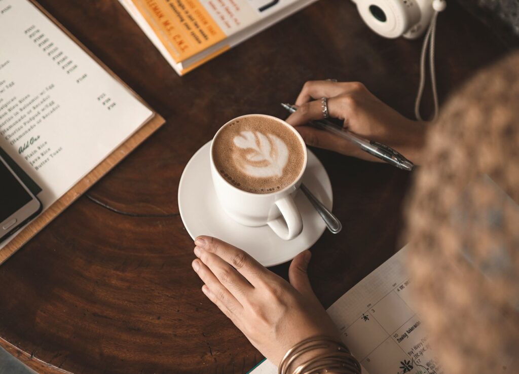 A wedding planner meeting with a couple over coffee — wedding planner Las Vegas