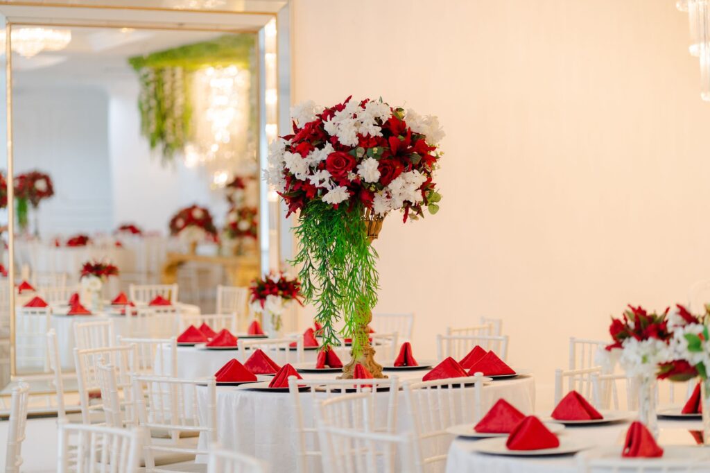 An elegant Las Vegas wedding reception setup with decor reflecting a vintage glamour theme. — Vegas wedding theme ideas