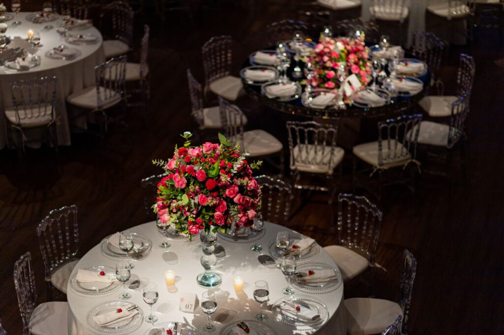 An elegant reception table decorated with flowers and candles in a Las Vegas wedding venue. — Las Vegas wedding packages