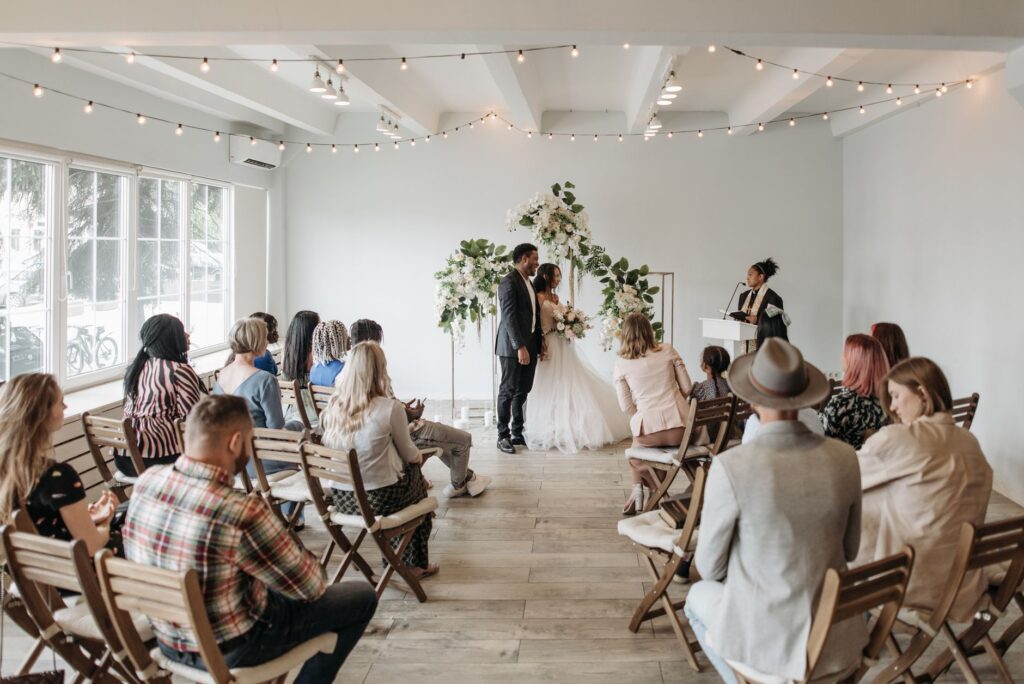 An image showcasing a Las Vegas wedding ceremony with guests in attendance. — Las Vegas wedding concierge services