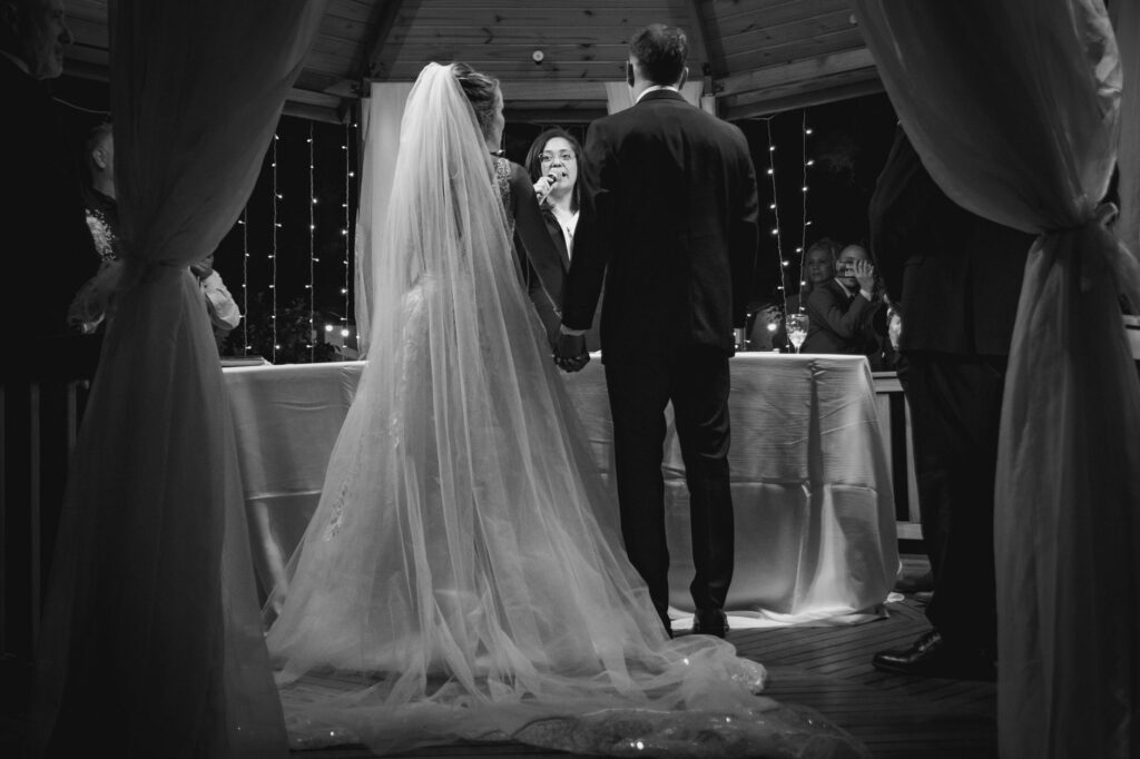 An officiant conducting a wedding ceremony at a popular Las Vegas venue. — Las Vegas wedding ceremony requirements