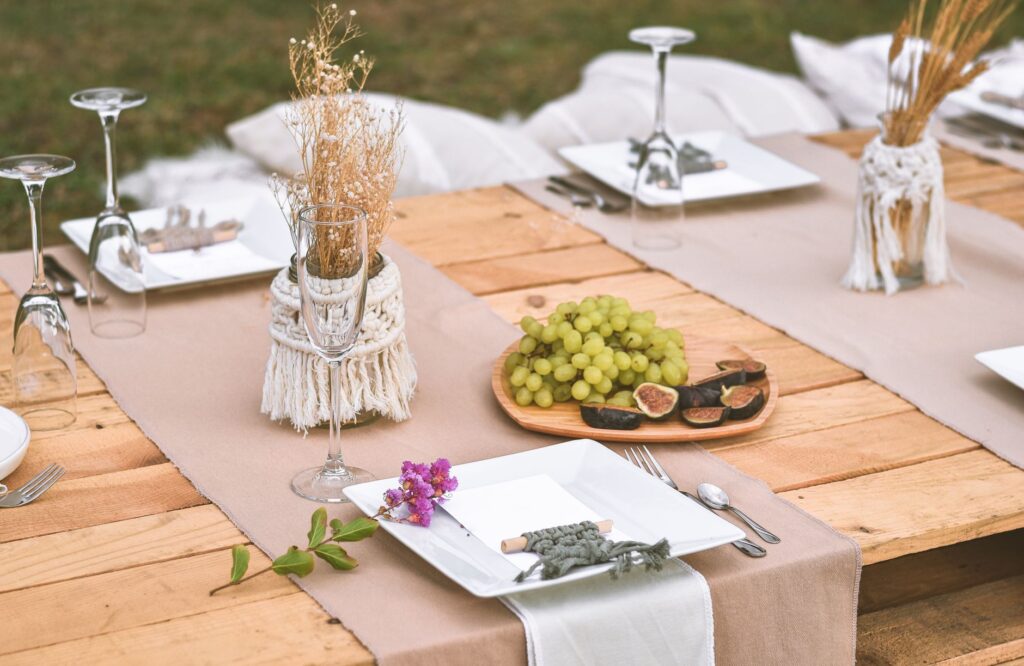 An outdoor bohemian wedding featuring macrame decorations and wildflower centerpieces in the desert. — Las Vegas wedding…