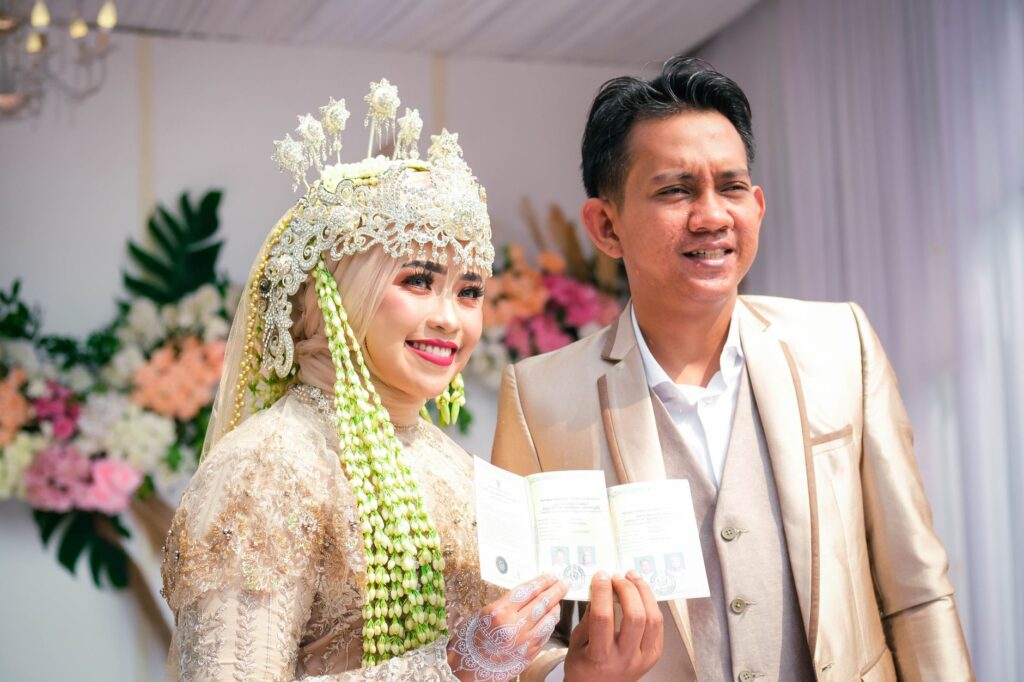 Couple celebrating after receiving their marriage license with smiles and excitement. — Las Vegas wedding license requir…