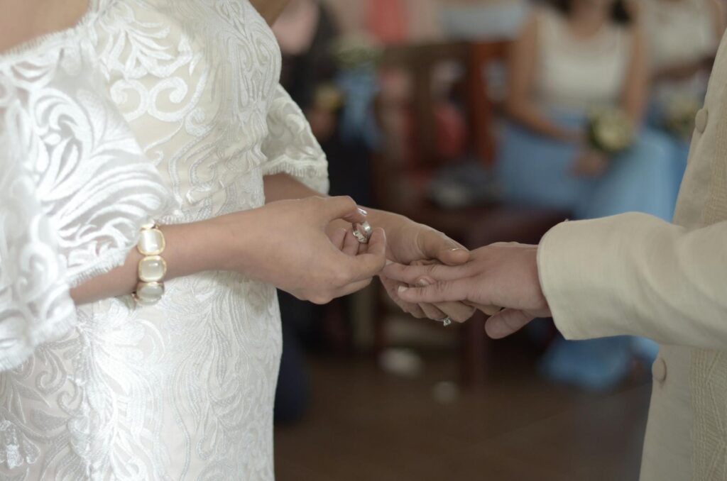 Couple exchanging vows in a scenic Las Vegas chapel — best time for Las Vegas wedding