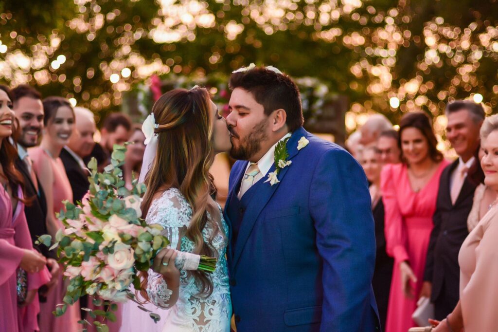 Couple sharing a kiss at a Las Vegas wedding chapel. — las vegas wedding weekend itinerary