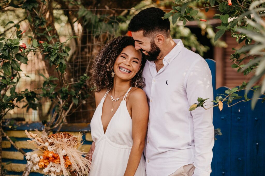 A candid shot of a couple laughing during their wedding photoshoot — Las Vegas wedding photographers