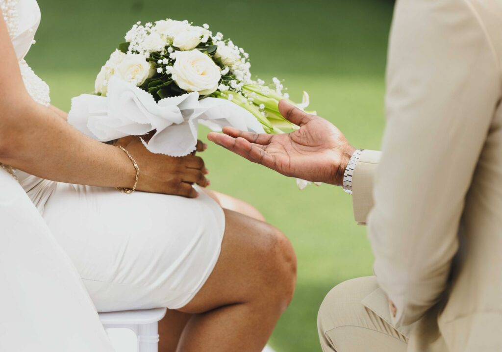 A candid shot of a wedding planner coordinating details at a wedding. — Las Vegas wedding planner