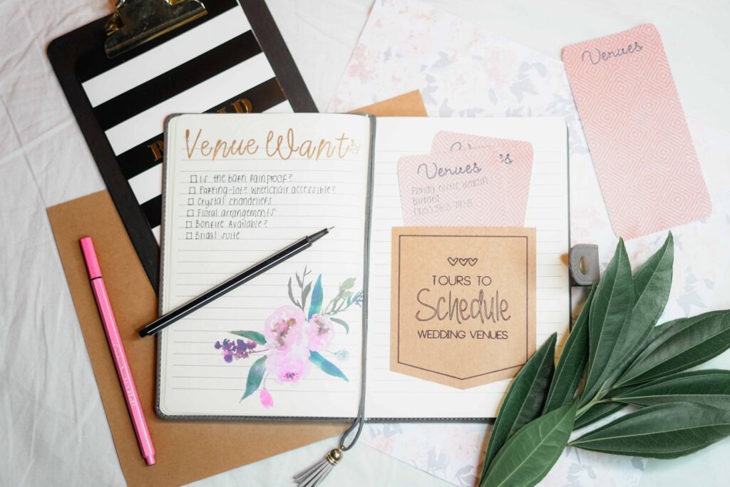 A close-up of a wedding planner's checklist and planning materials. — wedding planner Las Vegas