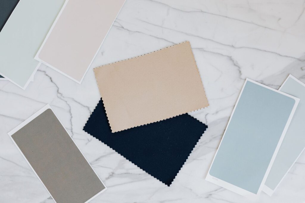A close-up of wedding planning materials like samples, swatches, and schedules. — best wedding planners Las Vegas 2026