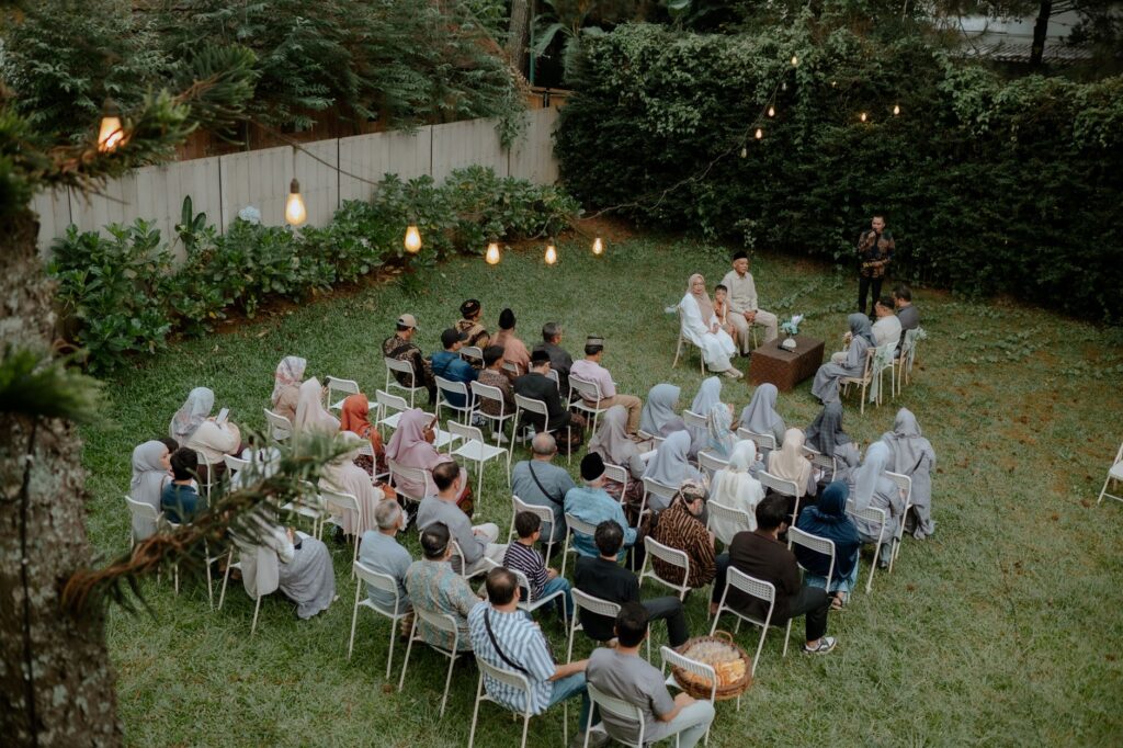 A couple celebrating their budget-friendly wedding with friends in a charming setting. — budget Las Vegas wedding