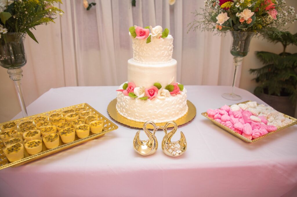 A delicious wedding cake decorated with elegant flowers, typical of Las Vegas catering. — wedding vendors Las Vegas