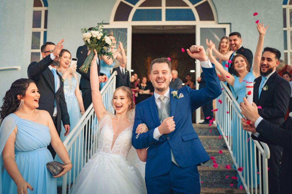 A happy couple celebrating their wedding day with friends and family. — wedding planner Las Vegas