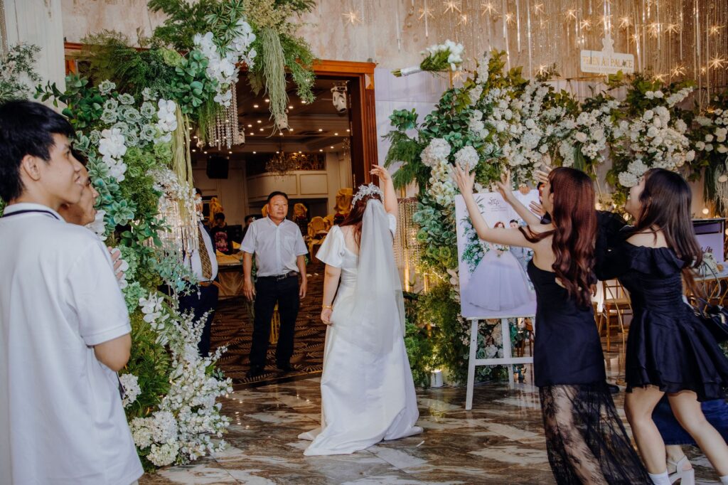 A joyful wedding reception at one of the top Las Vegas wedding venues, decorated with beautiful flowers.