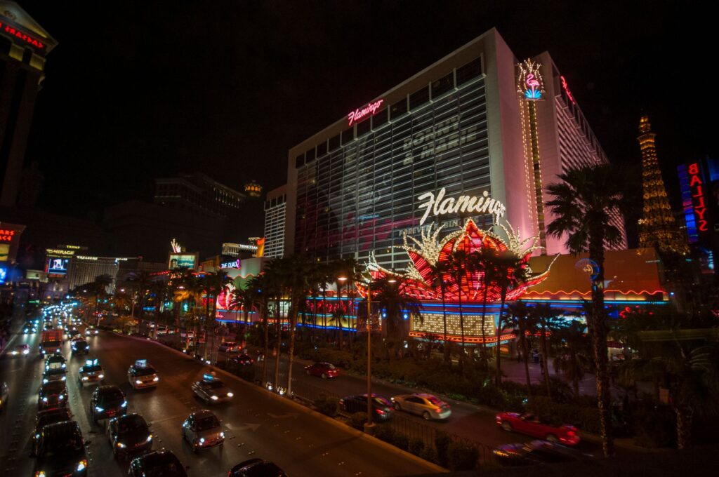 A romantic couple's portrait taken at sunset on the Las Vegas Strip. — Las Vegas elopement packages