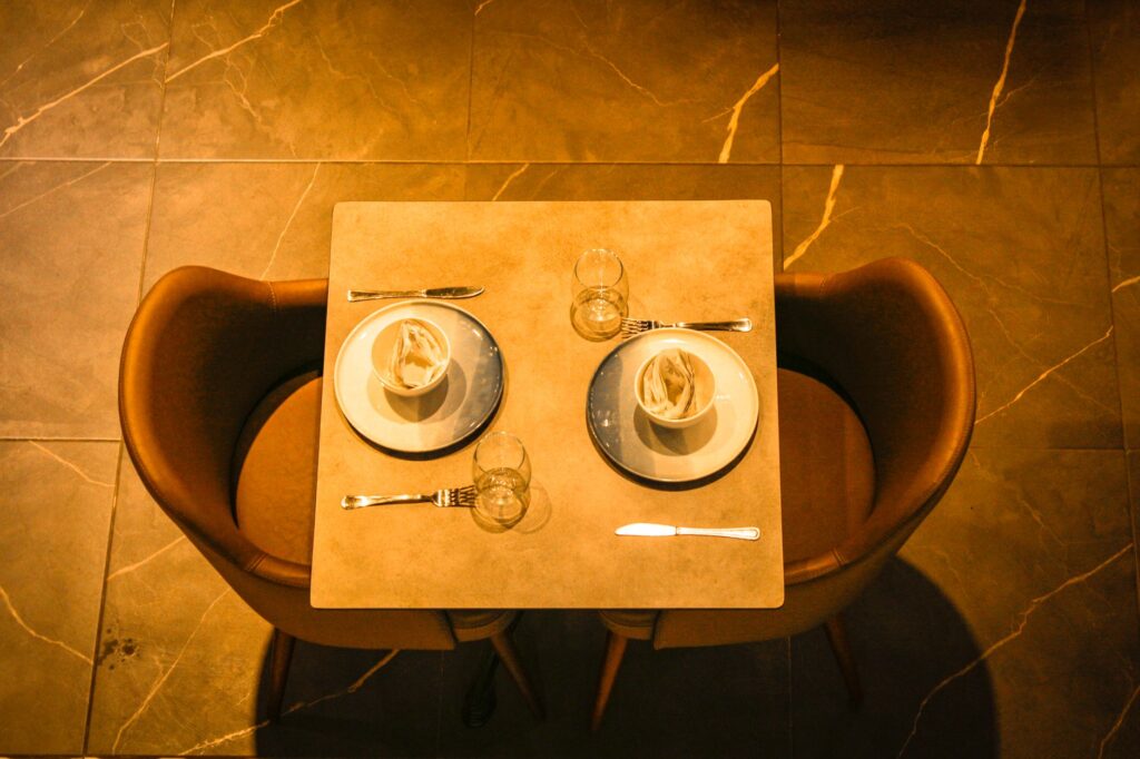 A romantic dinner setting for two at a top Las Vegas restaurant. — Las Vegas elopement