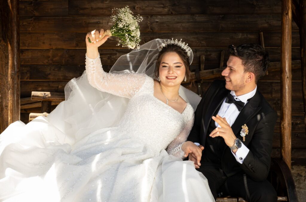 A smiling couple celebrating their wedding day on a budget — affordable wedding vendors Las Vegas