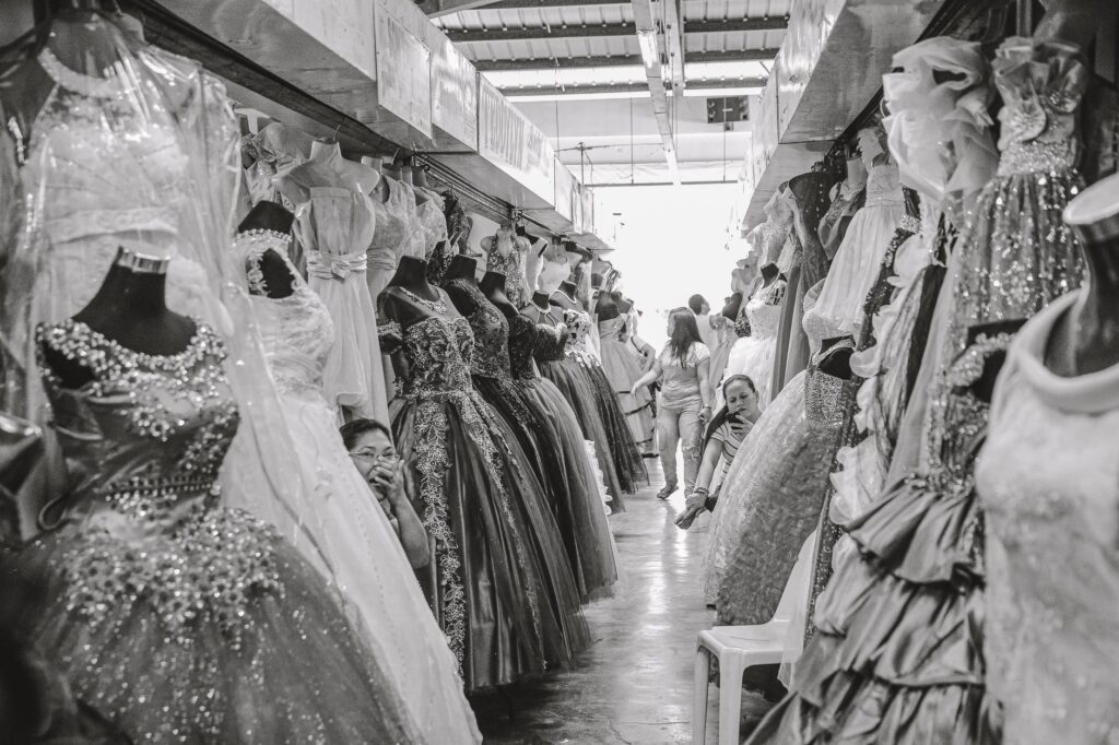 A wedding expo with couples interacting with vendors and collecting information about affordable wedding vendors Las Vegas