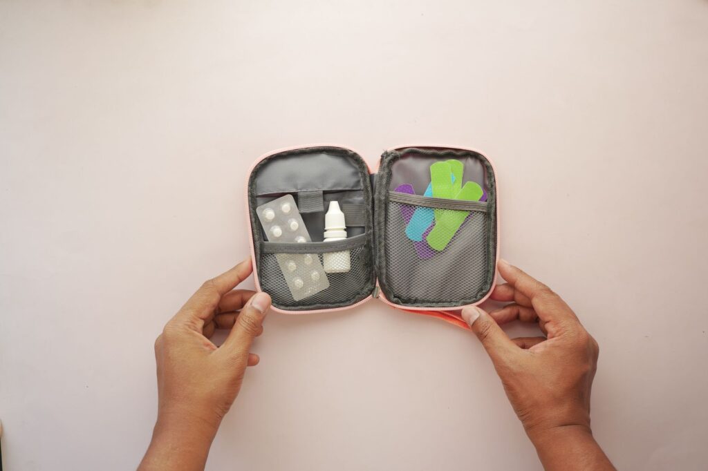 A well-organized wedding day emergency kit laid out with essential items.
