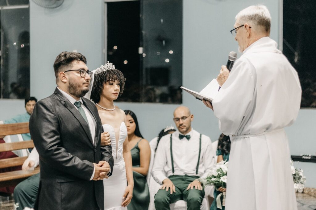 An Elvis impersonator officiating a themed wedding ceremony in Las Vegas. — themed weddings Las Vegas