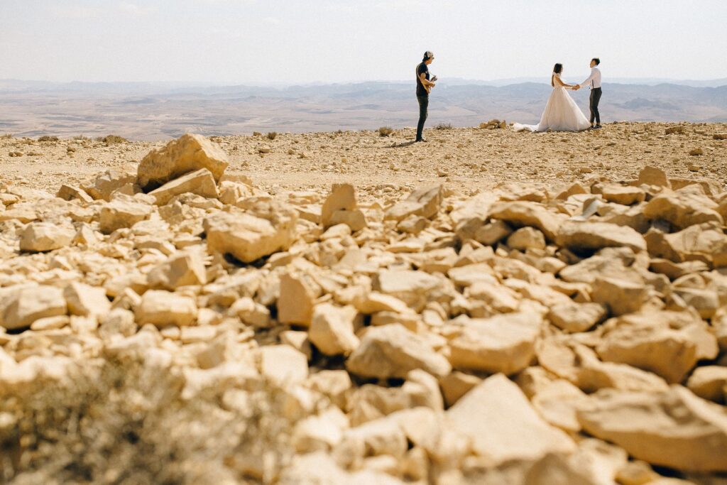 An aerial view of a wedding ceremony at Red Rock Canyon, capturing the natural beauty. — Las Vegas wedding photography